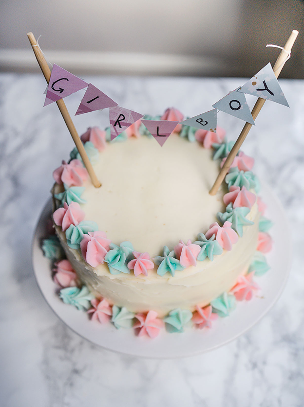 M&M gender reveal baby cake